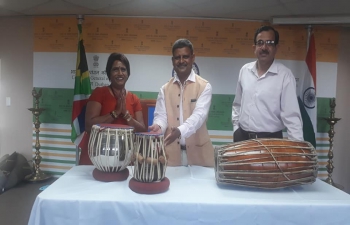 Consul (Consular Section ) Mr.A.K.Pathak and Director, SVCC Dr.C.P.Yogi gifted Music Instruments to Ms. Shirley Naidoo of Sri Sathya Sai Seva Organization of Puntans Hill today afternoon at Consulate General of India, Durban.