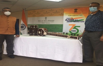 Musical instruments presentation to the representative of the Shri Luxmi Narayan Mandir at Mobeni Heights, Mr. Pradeep Ramlall by His Excellency Hon. Consul General of India, Durban, Mr. Anish Rajan.